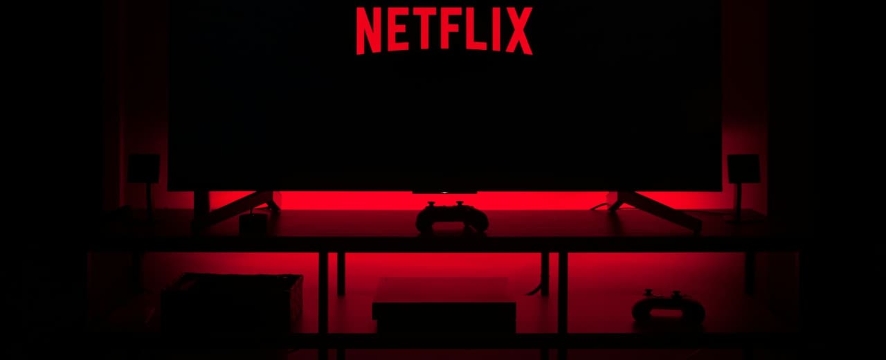 A television screen glowing in a darkened room