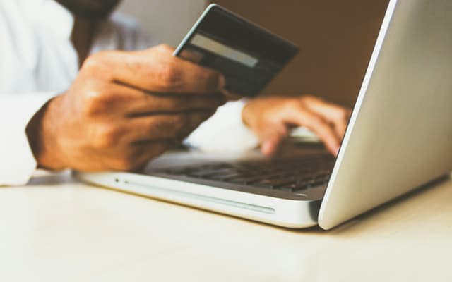 Payment cards fanned out on a surface